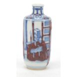 Chinese blue and white with iron red porcelain snuff bottle, hand painted with two scholars in a