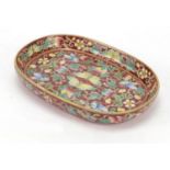 Chinese porcelain four footed dish, finely hand painted in the famille rose palette with butterflies