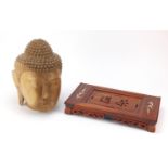 Chinese carved hardwood stand with mother of pearl inlay and a Buddha's head, the largest 40cm