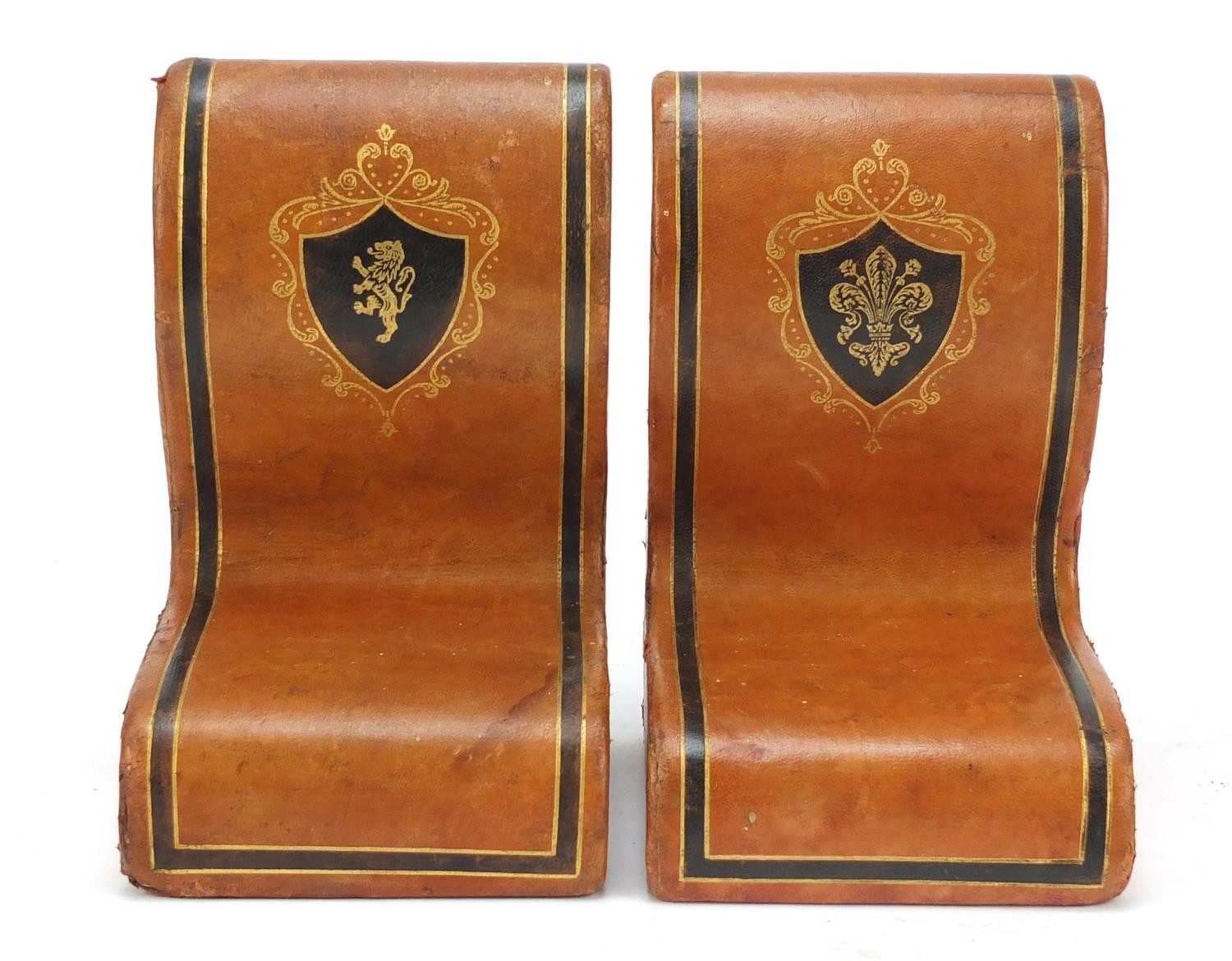 Pair of Italian tooled leather book ends with embossed crests, retailed by Harrods, each 17cm high : - Image 2 of 9