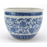 Chinese blue and white porcelain jardiniere, finely hand painted with flower heads amongst scrolling