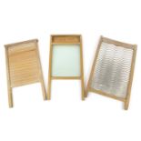 Three vintage washboards, the largest 58cm in length : For Further Condition Reports, Please Visit