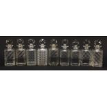Nine 19th century cut glass decanters with stoppers, each approximately 22.5cm high : For Further