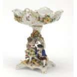 Vienna floral encrusted porcelain centrepiece with pierced basket, mounted with children and