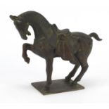 Chinese patinated bronze Tang style horse, 29.5cm in length : For Further Condition Reports,