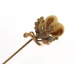 Victorian 14ct gold oak leaf tie pin set with a tooth? 6.5cm in length, 3.0g : For Further Condition
