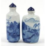 Two Chinese blue and white porcelain snuff bottles, decorated with landscapes, the largest 7.5cm