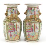 Pair of Chinese Canton porcelain vases with twin handles, each finely hand painted in the famille