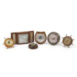 Six desk/wall barometers including an Art Deco example with thermometers, two ship's wheel design,
