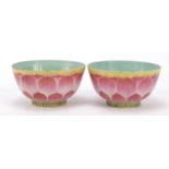 Pair of Chinese hand painted porcelain lotus bowls, six figure Qianlong character marks to the