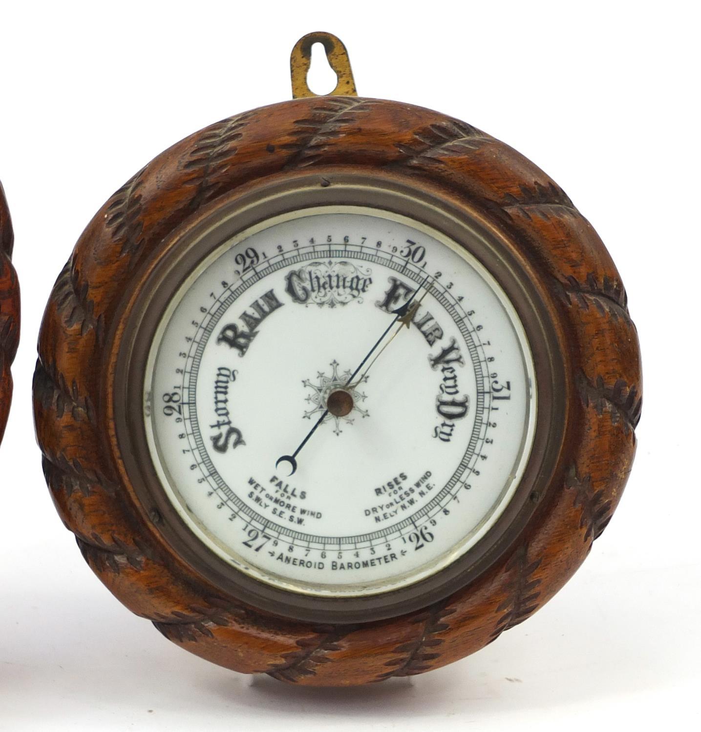 Two carved oak rope twist design wall barometers, the largest 27cm in diameter : For Further - Image 3 of 5