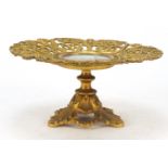 19th century gilt cast metal pierced tazza the central panel decorated with Queen Victoria's Osborne