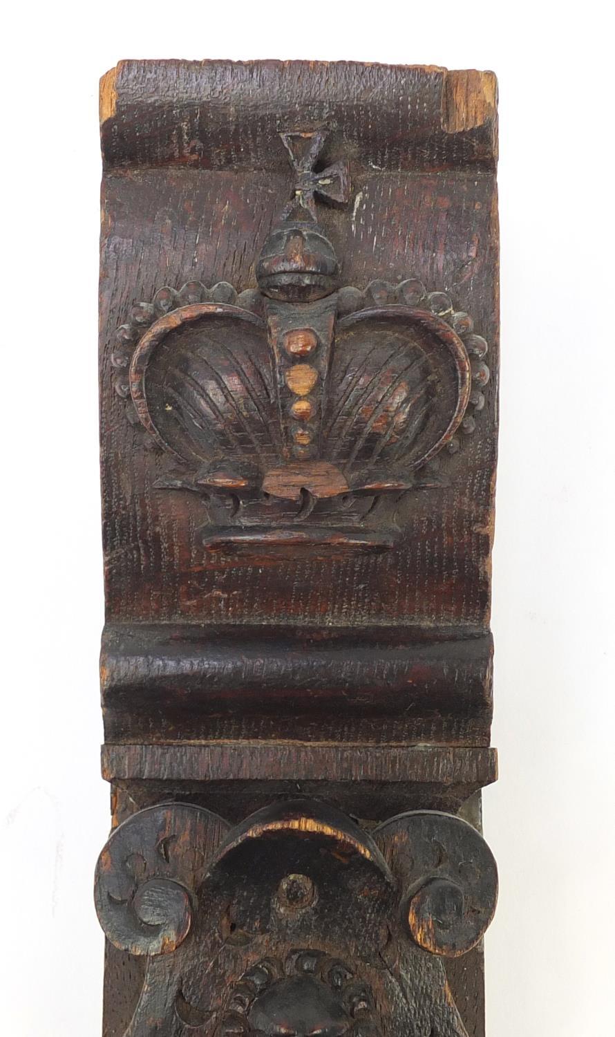 Early 17th century oak bracket carved with a gentleman in a hat and a royal crown, 31cm in - Image 4 of 7