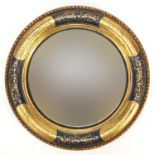 19th century gilt framed convex wall hanging mirror with foliate decoration, 27cm in diameter :