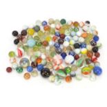 Vintage glass marbles including cat's eyes and milk glass examples : For Further Condition