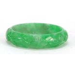 Chinese green jade bangle carved with flowers, 7.2cm in diameter : For Further Condition Reports,