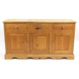 Pine sideboard fitted with three drawers above three cupboard doors, 86cm H x 156cm W x 45cm D : For