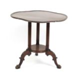 Mahogany centre table with pie crust edge, triple column legs and paw feet, 68cm H x 77cm W x 75cm D