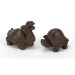 Two Japanese patinated bronze figures, one of a turtle, the other of a dragon, the dragon length 5cm