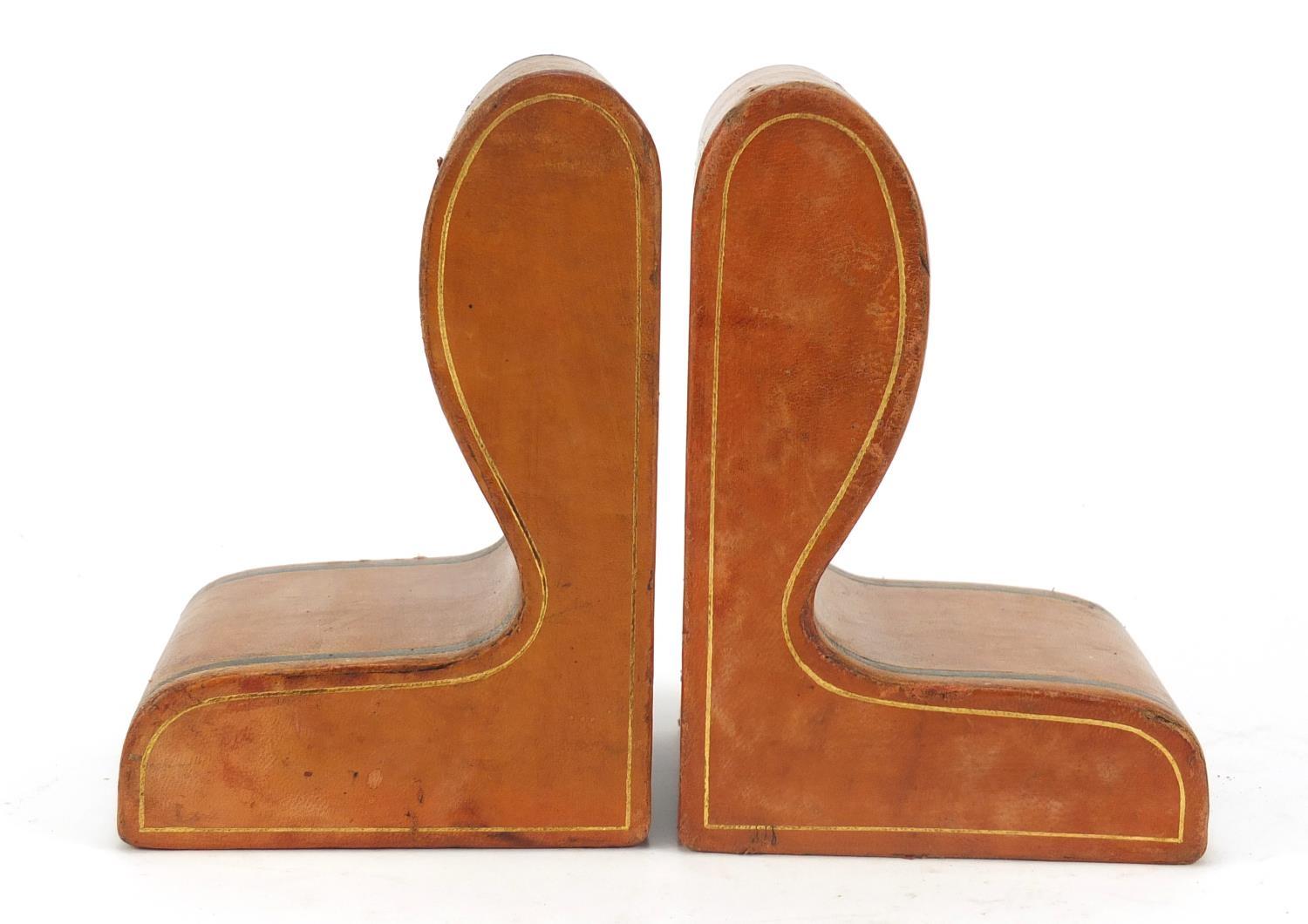 Pair of Italian tooled leather book ends with embossed crests, retailed by Harrods, each 17cm high : - Image 5 of 9