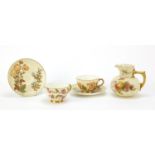 Royal Worcester Blush Ivory comprising a jug numbered 1376 and two cups with saucers, each decorated