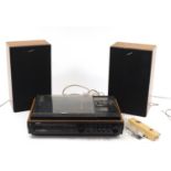 Sony stereo music system/program sensor and a pair of SS-33B speakers, the music system model HMK-