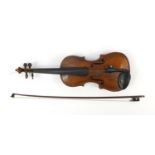 Old wooden violin with one piece back, bow with mother of pearl frog, fitted rosewood case and