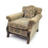 Walnut framed fireside chair with acanthus carved feet and green and beige floral upholstery, 80cm