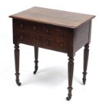 William IV mahogany side table fitted with four drawers on reeded fluted legs, 75cm H x 69cm W x