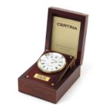 Certina marine quartz clock housed in a brass bound mahogany case, the dial 6.3cm in diameter :