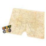 British military World War I three medal group with folding map, the medals including Territorial
