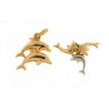 Two 9ct gold dolphin pendants, 0.8cm high, 1.4g : For Further Condition Reports, Please Visit Our