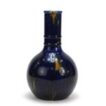 Linthorpe style art pottery vase in the manner of Christopher Dresser having a mottled blue glaze,