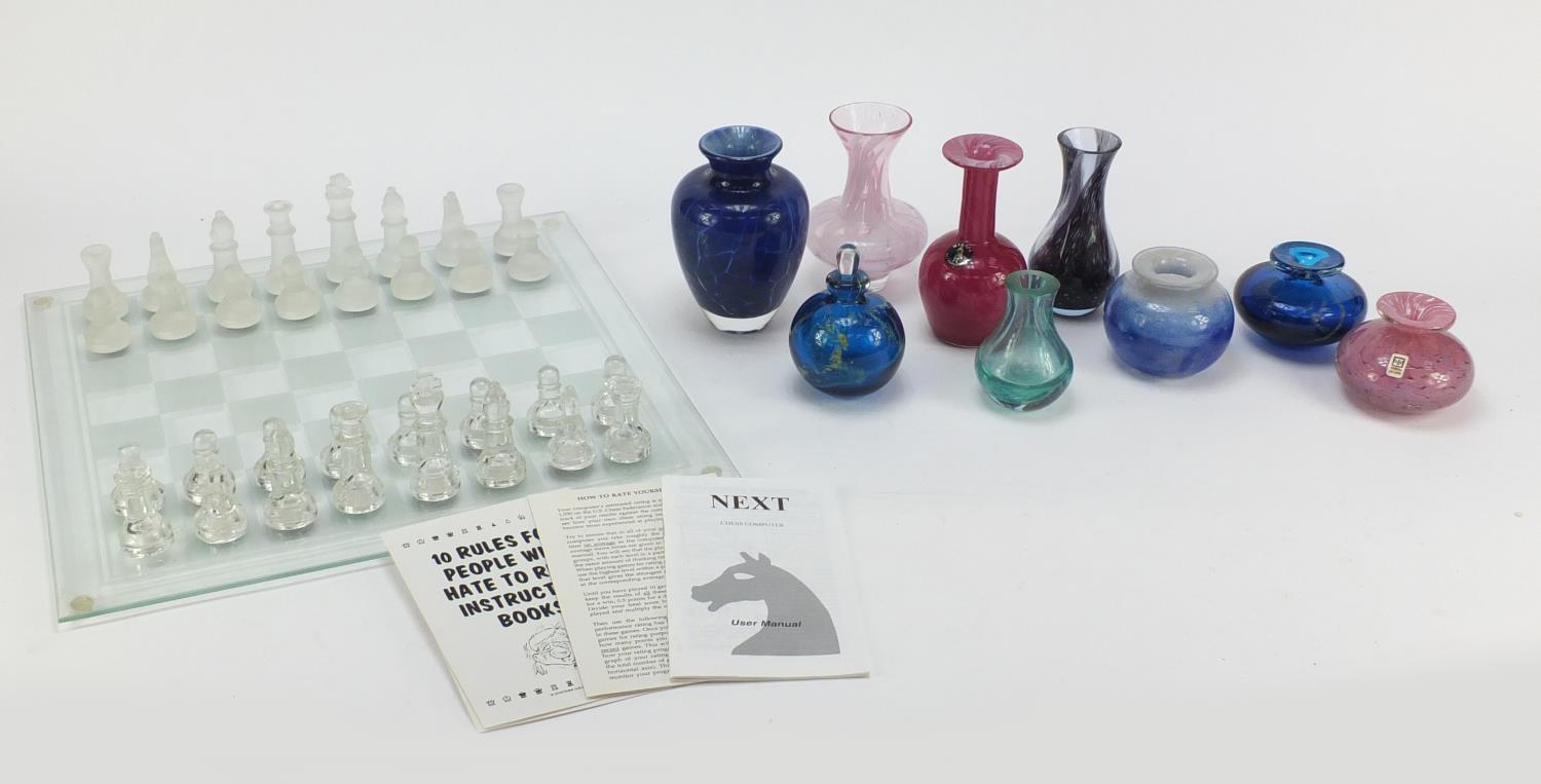 Colourful glass vases and scent bottles including Mdina and Caithness and a glass chess set : For