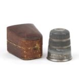 Silver plated whisky tot in the form of a thimble with leather case, engraved Just A Thimble Full,
