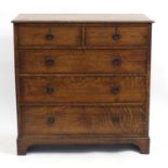 Edwardian oak five drawer chest fitted with two short above three long drawers, 107cm H x 116cm W