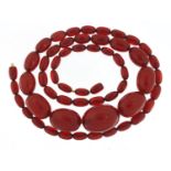 Cherry amber coloured bead necklace, 80cm in length, 61.4g : For Further Condition Reports, Please