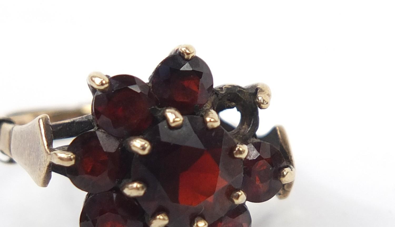 9ct gold garnet flower head ring, size N, 4.7g : For Further Condition Reports, Please Visit Our - Image 9 of 9