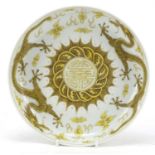 Chinese porcelain shallow dish hand painted in yellow with two dragons chasing a flaming pearl