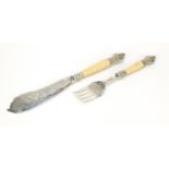 Pair of Victorian ascetic silver plated fish servers with engraved floral blades, the largest 35.5cm