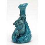 Minton style turquoise glaze pottery vase in the form of a Chinese man with a sack, 25cm high :