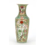 Chinese porcelain vase hand painted in the famille rose palette with panels of birds amongst flowers