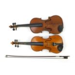 Two old wooden violins, one with bow, each with case, the backs 14 inches and 13.5 inches in