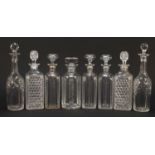 Eight 19th century and later glass decanters with stoppers comprising two pairs, set of three and