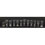 Twelve 18th/19th century jelly glasses including eleven with faceted bowls, some with knopped stems,