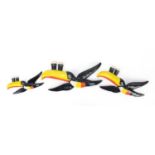 Graduated set of three Carlton ware Guinness toucan advertising wall plaques, the largest 26cm