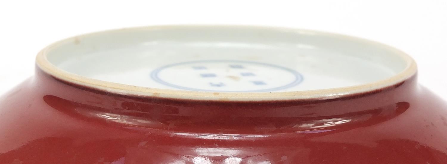 Chinese porcelain shallow bowl having a sang de boeuf glaze, six figure character marks to the - Image 5 of 5