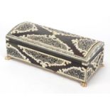 Anglo-Indian sandalwood, horn and ivory dome top casket with pen work panels and paw feet, 8.5cm H x