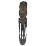 Large Sepik River tribal interest carved wood male ancestor figure from Papua New Guinea inlaid with
