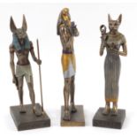 Three bronzed Egyptian figures, the largest 41cm high : For Further Condition Reports, Please